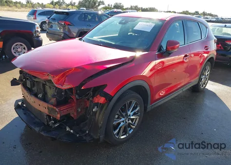 2021 Mazda Cx-5 Signature z USA, uszkodzony, nr VIN JM3KFBEY4M0400545